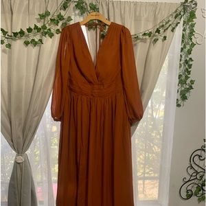 Long wedding guest or bridesmaid dress. Beautiful burnt orange/rust color.Size14